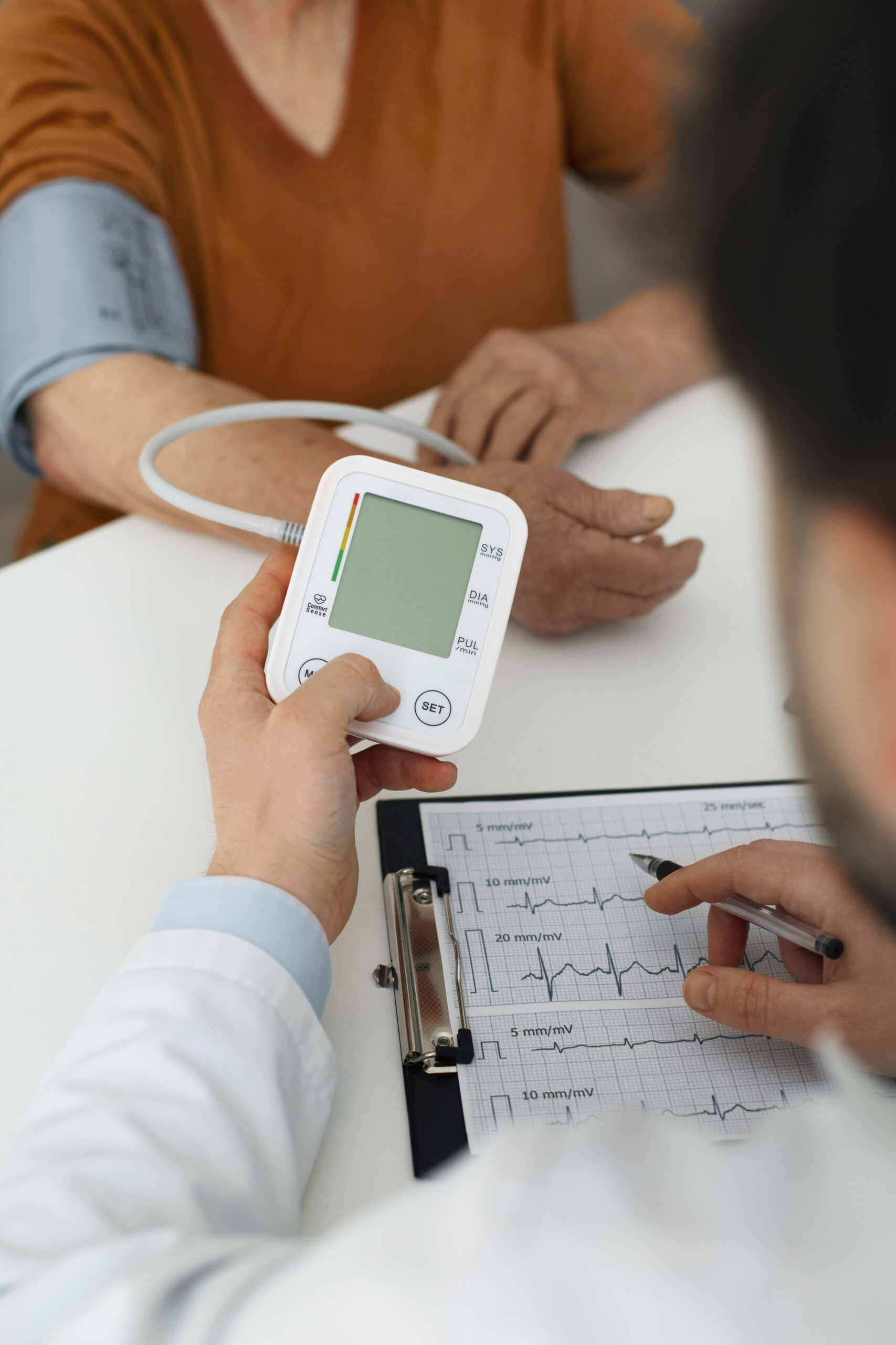 older person checking their blood pressure with tensiometer.jpg
